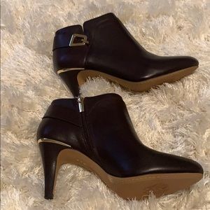 Never Worn! They don’t fit!